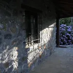 Stone House Among Trees