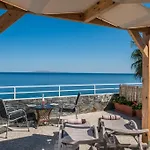 Exclusive Seaside Retreat With Shared Pool & Private Beach Access